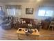 Inviting living room featuring laminate flooring, neutral decor and comfortable furniture at 1147 S Sioux Dr, Apache Junction, AZ 85119
