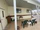 Covered patio area with outdoor seating, offering a relaxing space for leisure at 1147 S Sioux Dr, Apache Junction, AZ 85119
