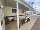 Covered patio area with outdoor seating, offering a relaxing space for leisure at 1147 S Sioux Dr, Apache Junction, AZ 85119
