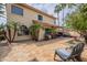 Spacious backyard with a patio, palm trees and a grill, perfect for outdoor gatherings at 11731 N 91St Pl, Scottsdale, AZ 85260