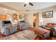 Comfortable living area with hardwood floors and access to kitchen and bathroom at 11731 N 91St Pl, Scottsdale, AZ 85260