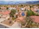 Aerial view of home with solar panels and tile roof in a quiet neighborhood at 13383 N 101St Way, Scottsdale, AZ 85260