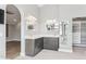 Bright bathroom featuring white countertops, gray cabinets and modern mirrors at 13383 N 101St Way, Scottsdale, AZ 85260
