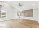 Spacious primary bedroom boasts tray ceilings, neutral walls, and vinyl floors at 13383 N 101St Way, Scottsdale, AZ 85260