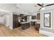 Modern kitchen features stainless appliances, wood cabinets, granite countertops, and a center island at 13383 N 101St Way, Scottsdale, AZ 85260
