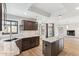 Gourmet kitchen with granite countertops and a center island at 13383 N 101St Way, Scottsdale, AZ 85260
