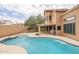 Sparkling pool in a private backyard setting with a covered patio at 13383 N 101St Way, Scottsdale, AZ 85260