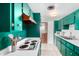 Charming kitchen showcasing green cabinets, vintage stove, and modern fixtures at 1340 E Golden Ln, Phoenix, AZ 85020