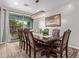 Formal dining room with stylish chandelier and seating for eight, perfect for entertaining at 16268 W Cortez St, Surprise, AZ 85379