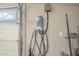Garage featuring an EV charger, providing convenient at-home electric vehicle charging at 16462 W Rowel Rd, Surprise, AZ 85387