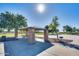 Outdoor picnic shelter with stone pillars, benches and tables for community gatherings and picnics at 16462 W Rowel Rd, Surprise, AZ 85387