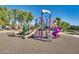 Community playground with slides and climbing structures, designed for outdoor fun and activity at 16462 W Rowel Rd, Surprise, AZ 85387