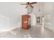 Spacious bedroom featuring an in-home sauna, ceiling fan, and ample natural light at 1701 E Yukon Dr, Phoenix, AZ 85024