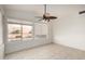 Bedroom with neutral color palette and large windows at 1701 E Yukon Dr, Phoenix, AZ 85024