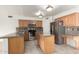 Well-equipped kitchen with stainless steel appliances and granite countertops at 1701 E Yukon Dr, Phoenix, AZ 85024