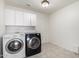The laundry room features modern washer and dryer units at 1701 E Yukon Dr, Phoenix, AZ 85024