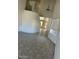 Open-concept living room featuring tile flooring and a decorative light fixture at 1701 E Yukon Dr, Phoenix, AZ 85024