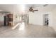 Spacious living room featuring tile floors and neutral decor at 1701 E Yukon Dr, Phoenix, AZ 85024