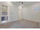 Expansive bedroom with stylish decor includes a desk area and large windows at 17756 E Colt Dr, Queen Creek, AZ 85142