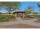 Park gazebo surrounded by landscaping and walking path for community members to enjoy at 17756 E Colt Dr, Queen Creek, AZ 85142