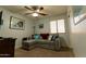 Comfortable bedroom featuring a convertible sofa and nautical-themed decor at 1844 E Angelica St, Casa Grande, AZ 85122