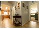 Bright hallway with decor leading to a bedroom and kitchen at 1844 E Angelica St, Casa Grande, AZ 85122