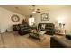 Inviting living room showcases comfortable seating, ceiling fan, and neutral-toned walls at 1844 E Angelica St, Casa Grande, AZ 85122