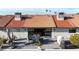 Aerial view of the back of the house featuring the patio and landscaped yard at 1960 Leisure World --, Mesa, AZ 85206