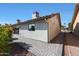 Side exterior view, features clean architectural lines and a well-maintained walkway at 1960 Leisure World --, Mesa, AZ 85206