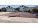 Charming single-story home with a well-maintained desert front yard and a two-car garage and terra cotta roof at 1960 Leisure World --, Mesa, AZ 85206