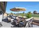 Relaxing patio with comfortable seating and golf course views, perfect for enjoying the outdoors at 1960 Leisure World --, Mesa, AZ 85206