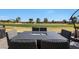 Back patio area with seating and stunning golf course views at 1960 Leisure World --, Mesa, AZ 85206