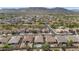 An aerial view of a quiet neighborhood featuring charming homes, lush landscaping, and private backyards, some with pools at 2146 W Ian Dr, Phoenix, AZ 85041