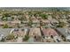 Aerial view of a suburban neighborhood with backyard pools and solar panels at 2146 W Ian Dr, Phoenix, AZ 85041