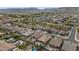 An aerial photograph of a Primary-planned community, exhibiting tidy homes, well-kept yards, and several private swimming pools at 2146 W Ian Dr, Phoenix, AZ 85041