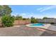 Private backyard features a pool, mature landscaping and privacy at 2146 W Ian Dr, Phoenix, AZ 85041