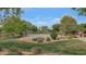 Neighborhood park featuring a full basketball court, picnic benches and mature landscaping at 2146 W Ian Dr, Phoenix, AZ 85041