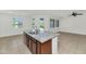 Stylish kitchen island featuring granite countertops, a double sink, and ample counter space at 2146 W Ian Dr, Phoenix, AZ 85041