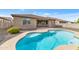 Backyard featuring a pool, covered patio, and a landscaped yard at 2146 W Ian Dr, Phoenix, AZ 85041