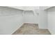 Walk-in closet with carpeted floors, white walls, and wooden shelving at 2146 W Ian Dr, Phoenix, AZ 85041