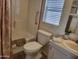 This bathroom features a tub/shower combo and neutral-colored vanity at 2460 E Main St # A2, Mesa, AZ 85213