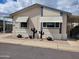 Single-story home features low maintenance desert landscaping and awnings at 2460 E Main St # A2, Mesa, AZ 85213