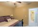 Bedroom with a queen-size bed and an attached bathroom at 2611 E San Simeon Dr, Casa Grande, AZ 85194