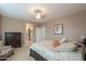 Comfortable bedroom with a view of the entrance to the en suite bath and walk in closet at 2611 E San Simeon Dr, Casa Grande, AZ 85194