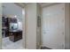 Entryway showcasing seamless flow to the kitchen with stainless steel appliances and ample counter space at 2611 E San Simeon Dr, Casa Grande, AZ 85194