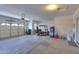 Spacious garage with high ceilings and ample room for vehicles, golf cart and storage at 2611 E San Simeon Dr, Casa Grande, AZ 85194