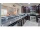 Stylish kitchen featuring granite countertops, stainless steel appliances, and ample cabinet space at 2611 E San Simeon Dr, Casa Grande, AZ 85194