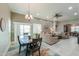 Open-concept living area with neutral tones, comfortable seating, and bright natural light at 2611 E San Simeon Dr, Casa Grande, AZ 85194