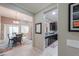 Open-concept living space flowing into the dining area with stylish furnishings and natural light at 2611 E San Simeon Dr, Casa Grande, AZ 85194