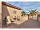 Outdoor patio with elegant water fountain and seating area, perfect for relaxation and outdoor living at 2611 E San Simeon Dr, Casa Grande, AZ 85194